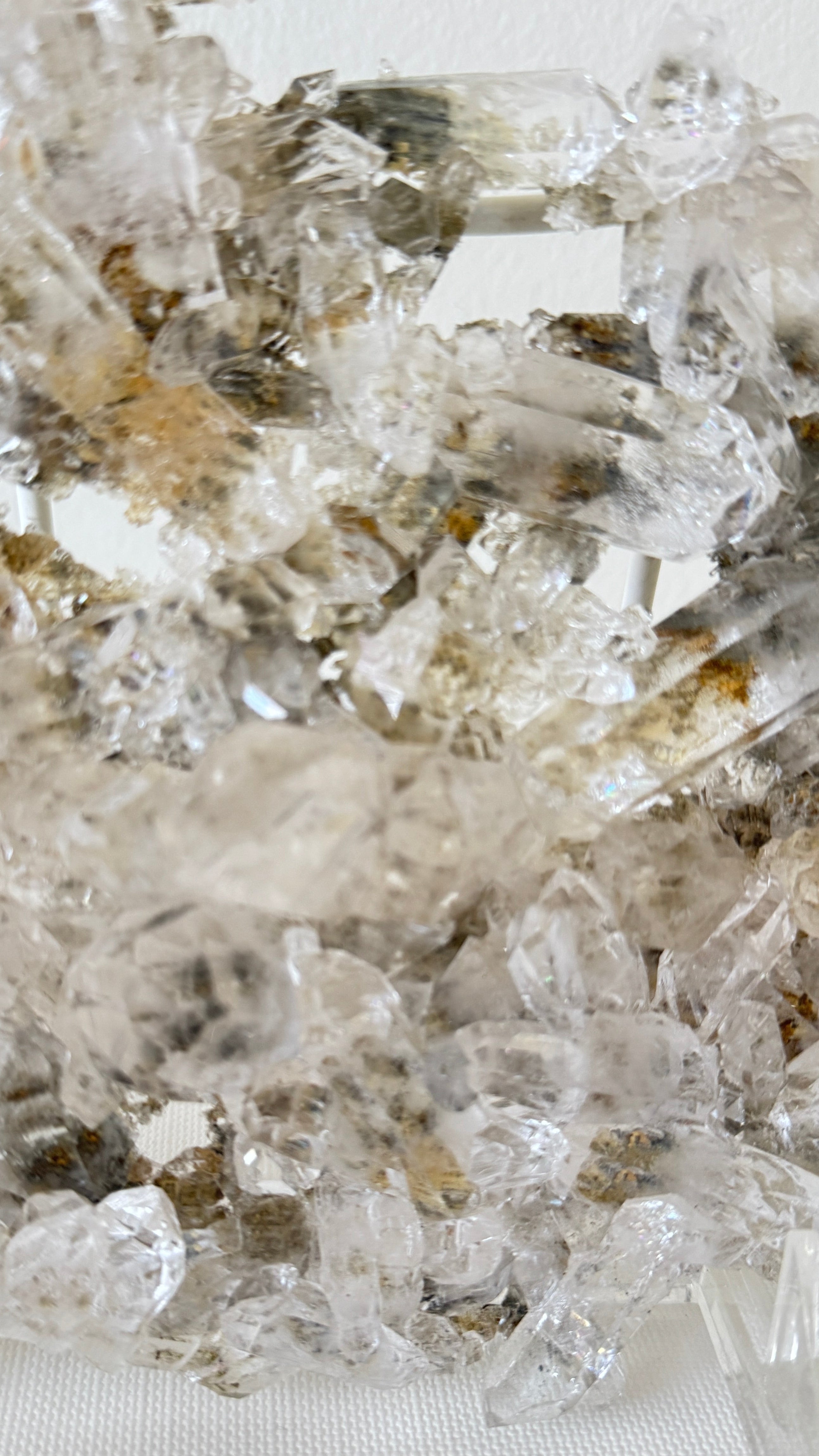 Close-up of crystal formations on a white background