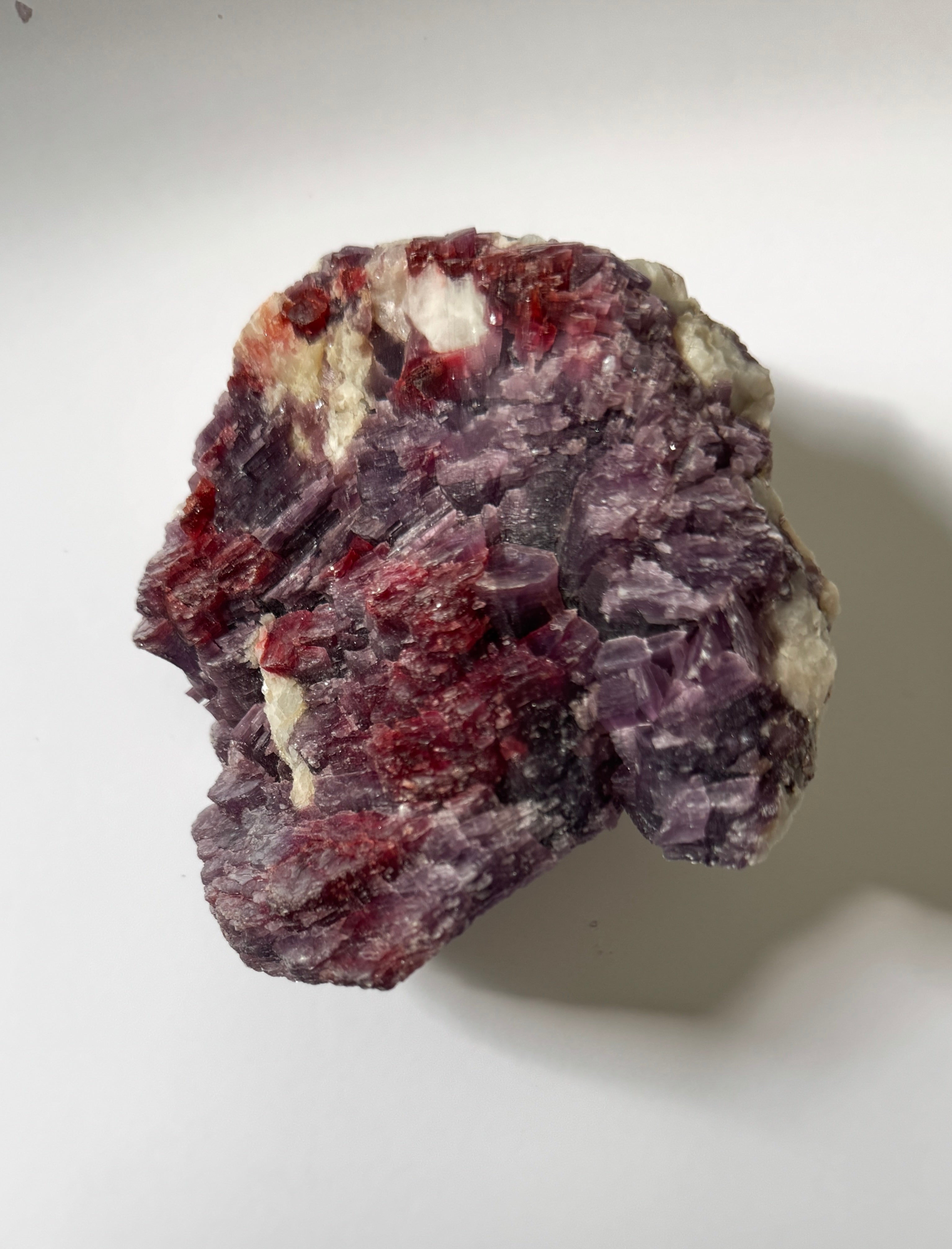 "Lepidolite with Rubellite crystal for emotional healing and heart chakra work"