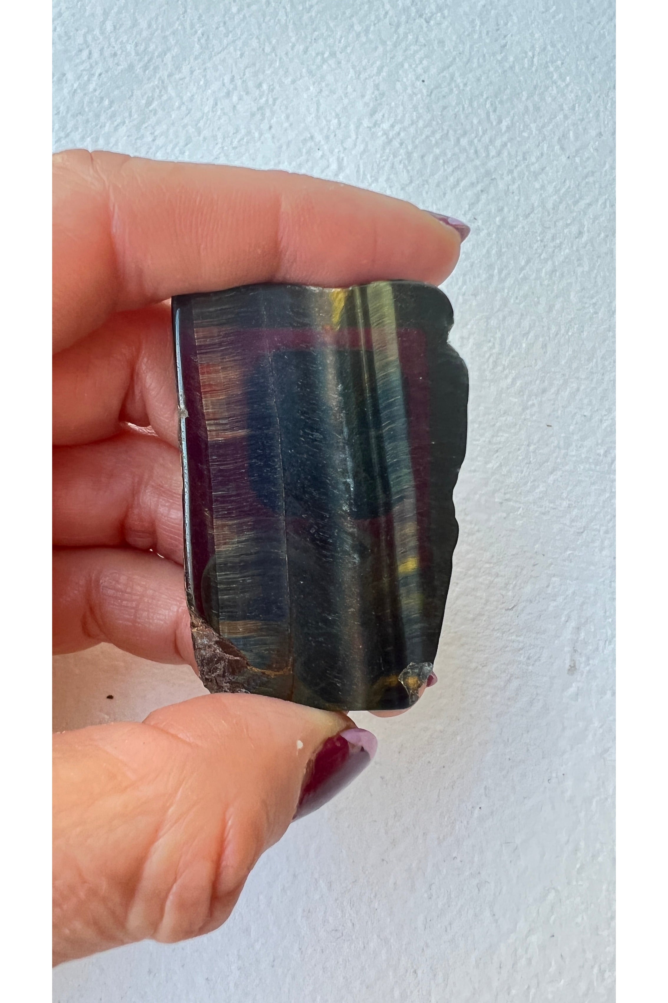 Tiger's eye polished crystal slab with golden and brown bands