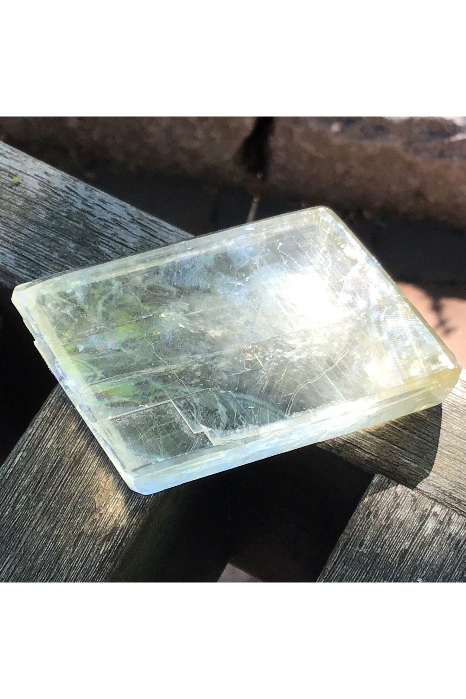 Clear Optical Calcite Prism Displaying Light Spectrum