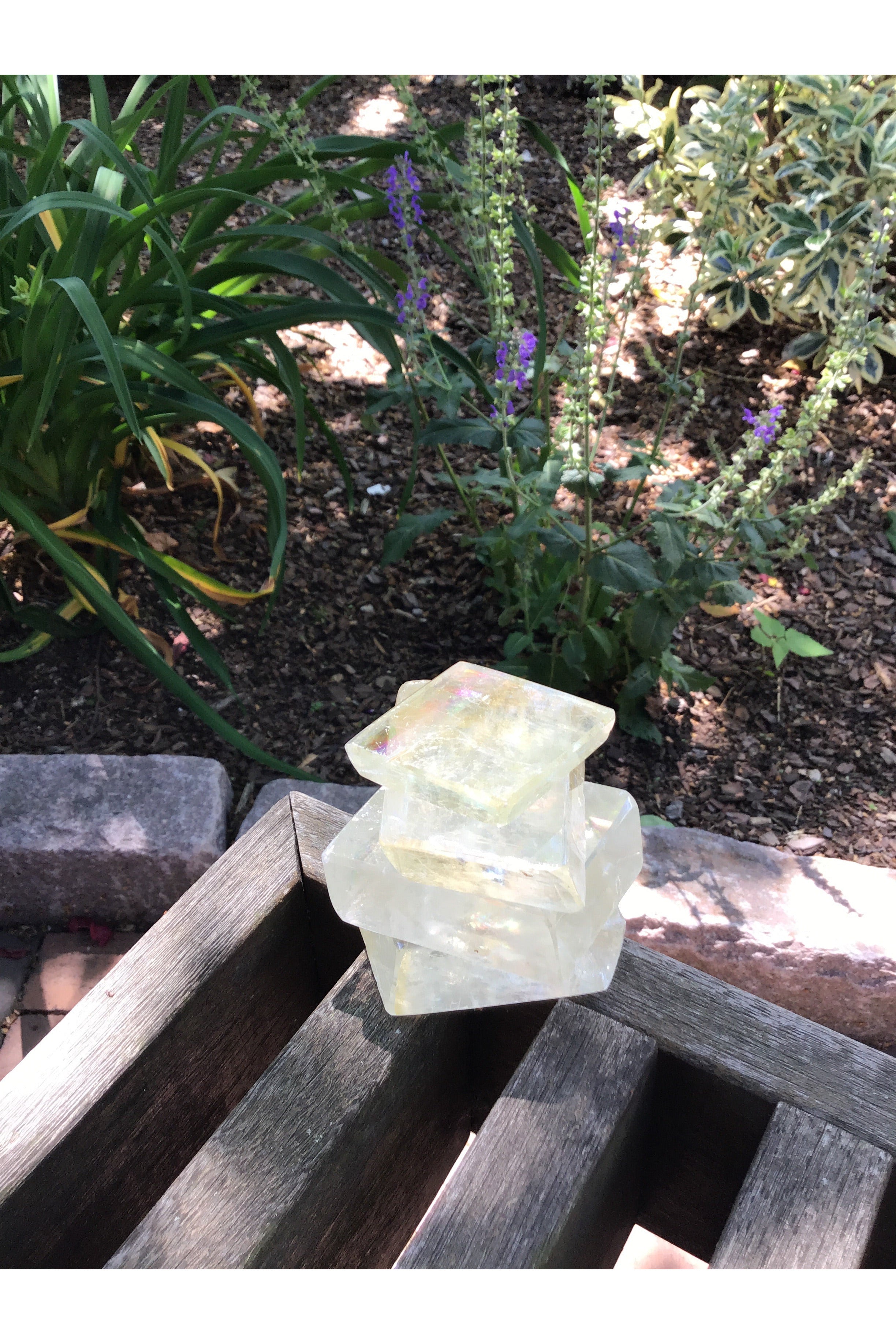 Optical Calcite Prism Reflecting Light and Rainbows