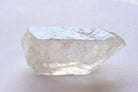 Clear quartz crystal on a white background