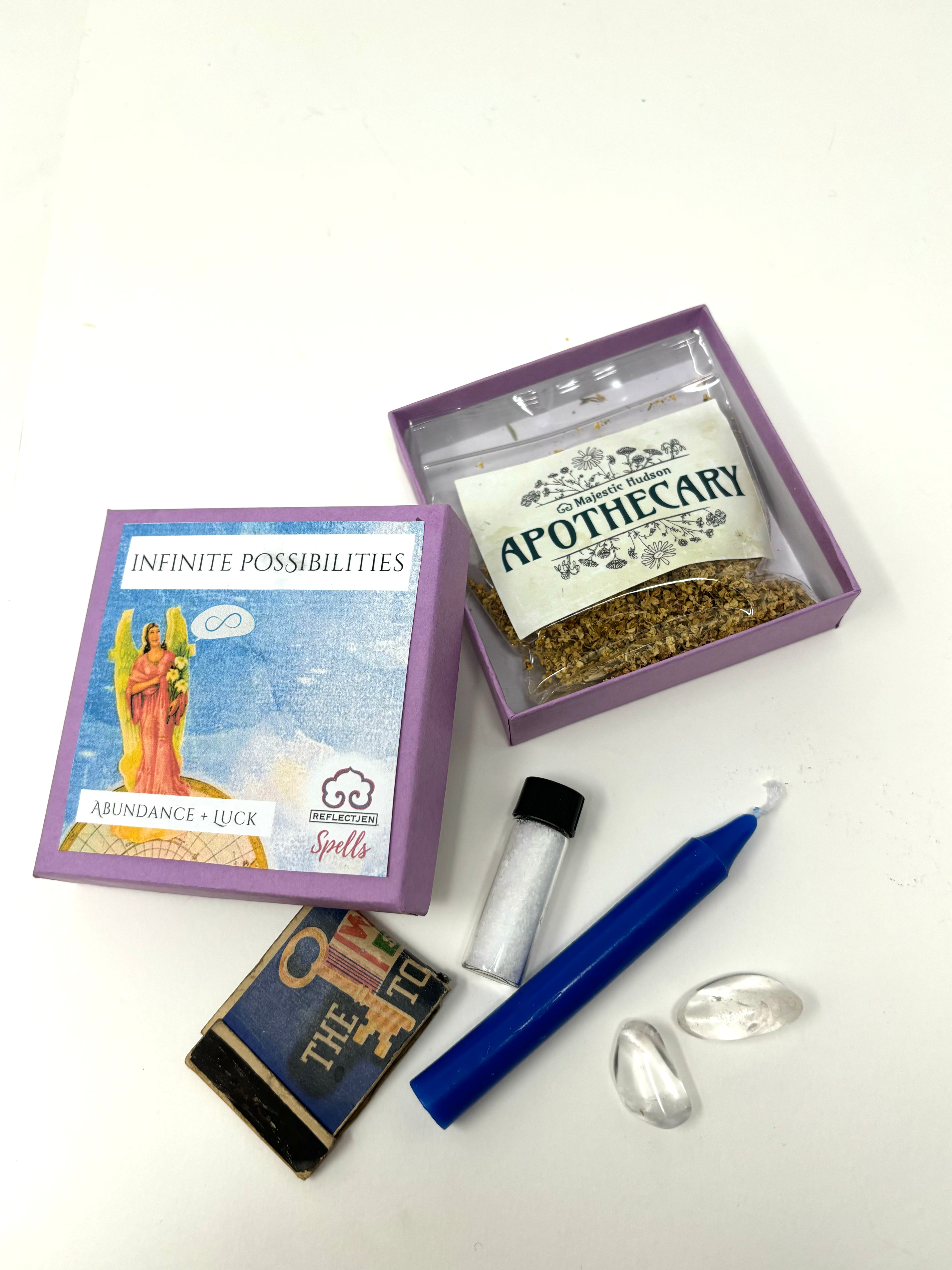 Abundance Spell Kit with Clear Quartz crystals, blue ritual candle, and elder flower