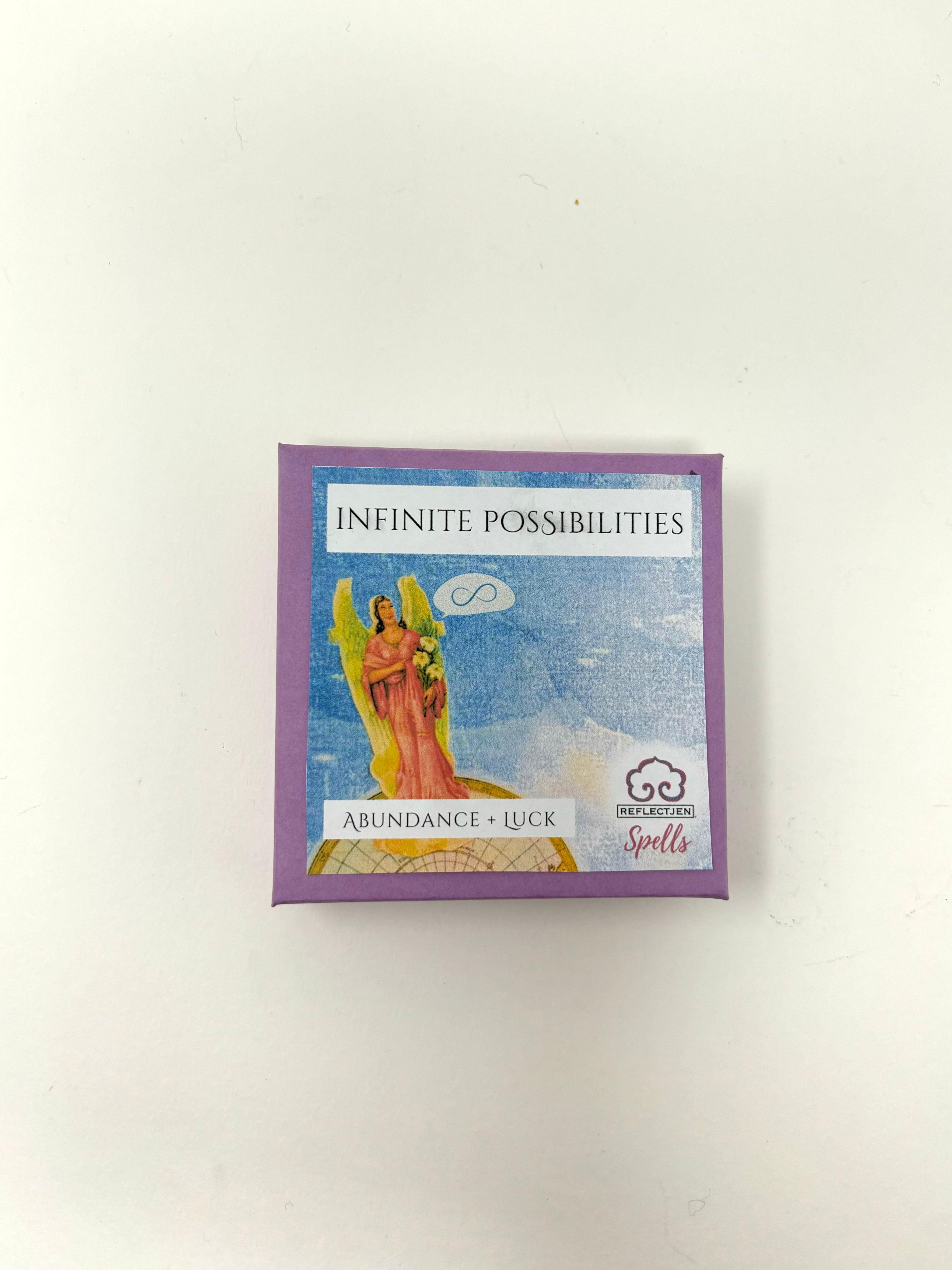 Abundance Spell Kit with Clear Quartz crystals, blue ritual candle, and elder flower