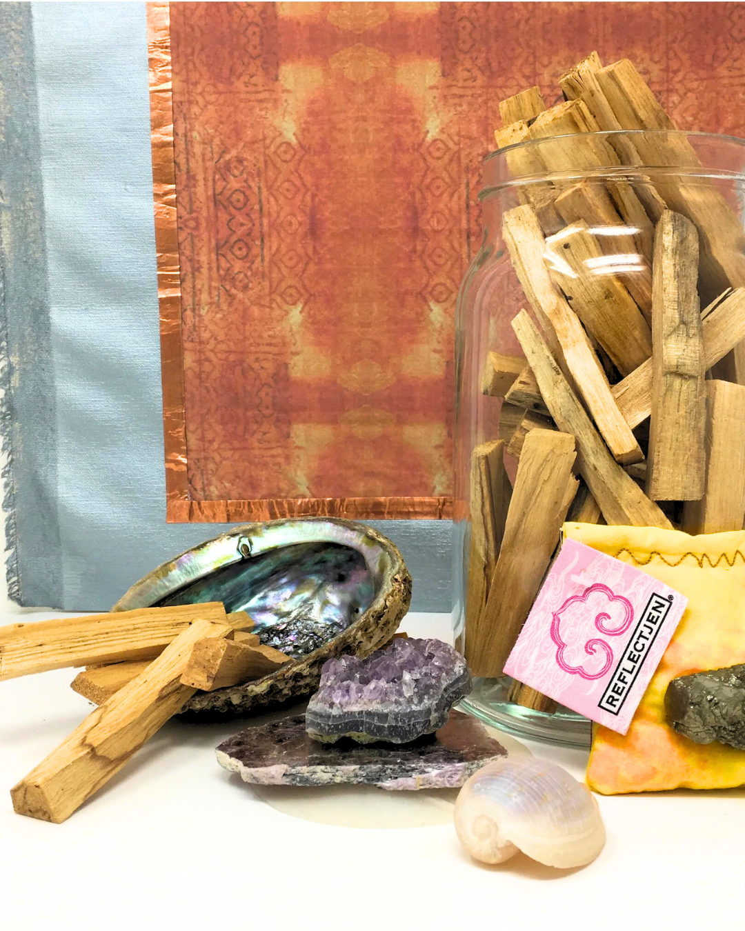 Palo Santo placed on a spiritual altar beside crystals and herbs — a sacred tool for purification and meditation.