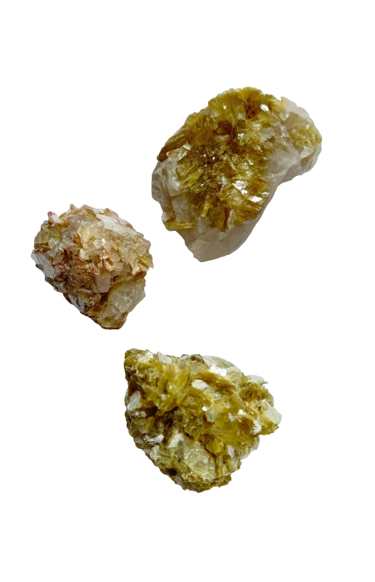Three lepidolite crystal rocks on a white background