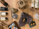 Palo Santo bricks styled on an altar beside crystals and herbs — ideal for sacred smudging and intentional living.